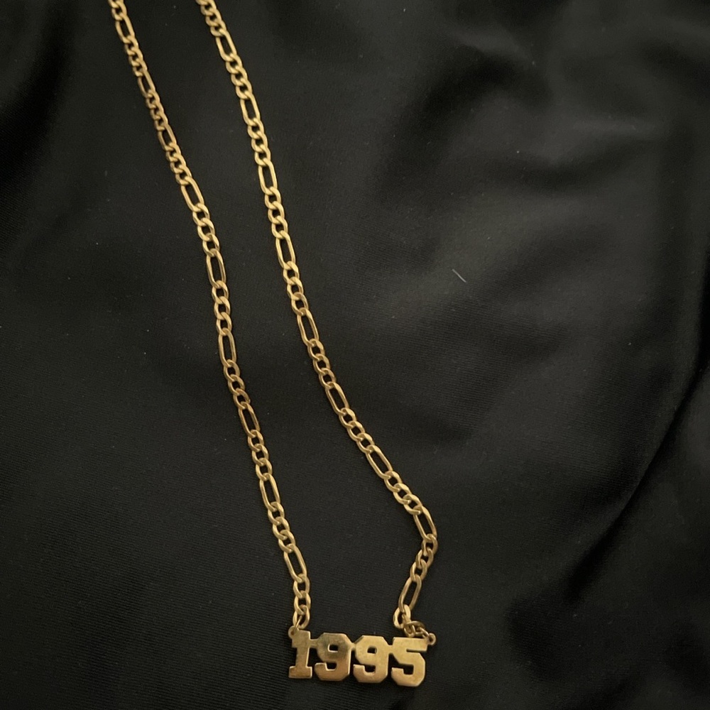 the m jeweller 1995 year necklace